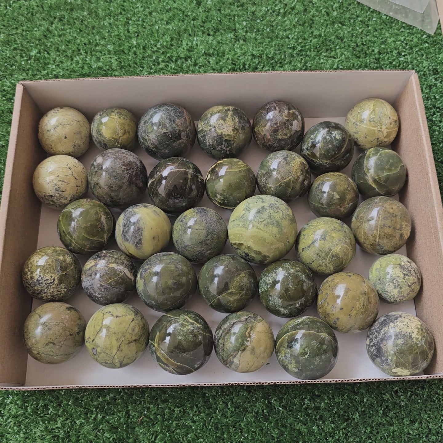 Load video: 33 pc green serpentine spheres