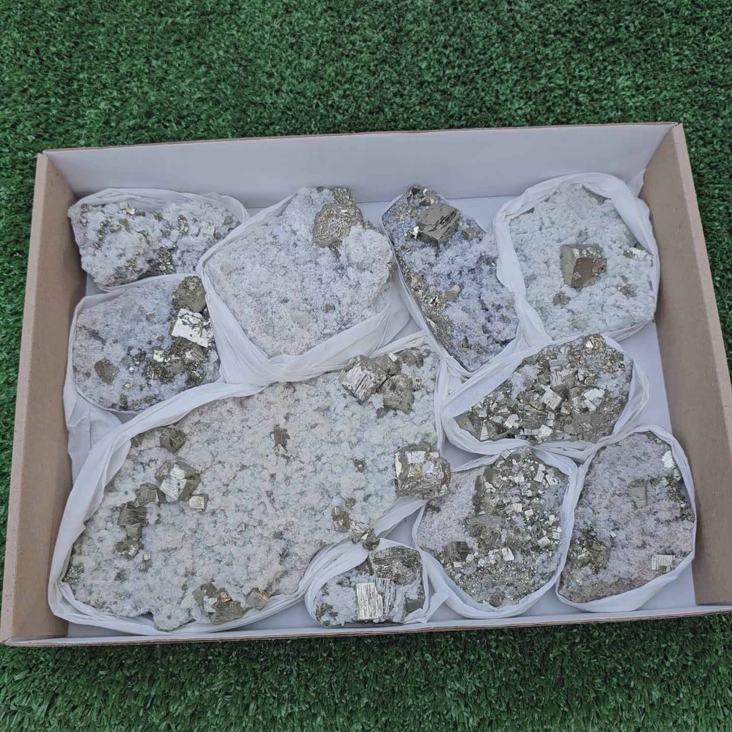 Load video: 10 pc Pyrite Cubic with calcite flourecent