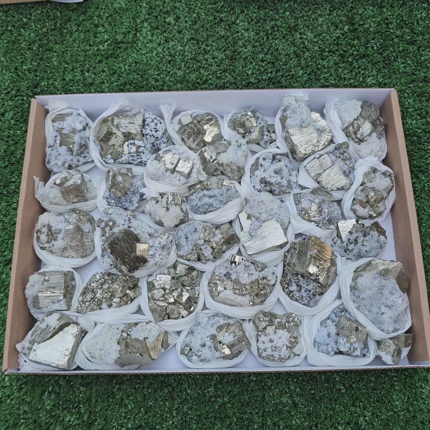 Load video: 33 pc Pyrite Cubic with calcite flourecent