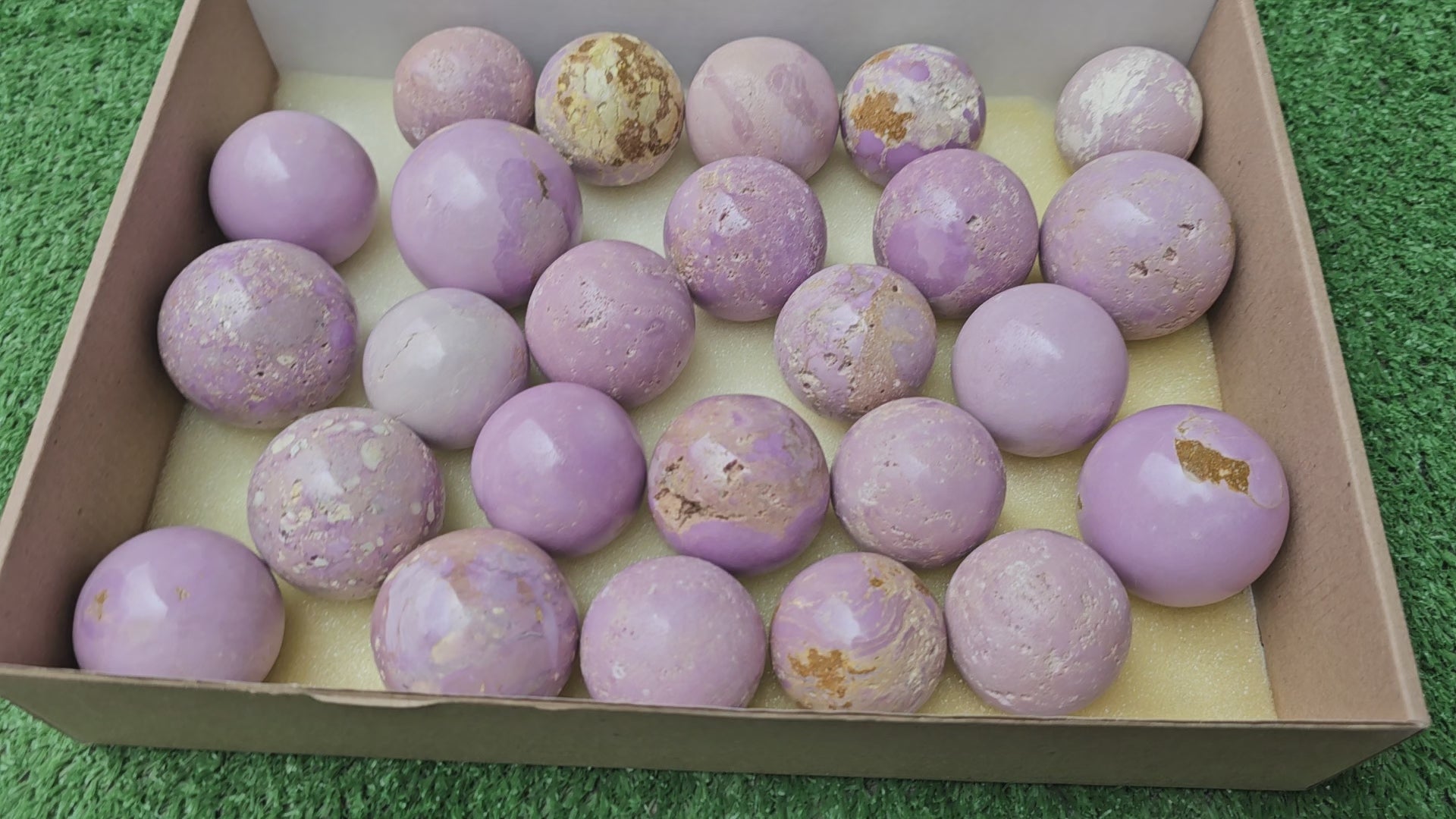 Load video: Lot 25 spheres Phosphosiderite*