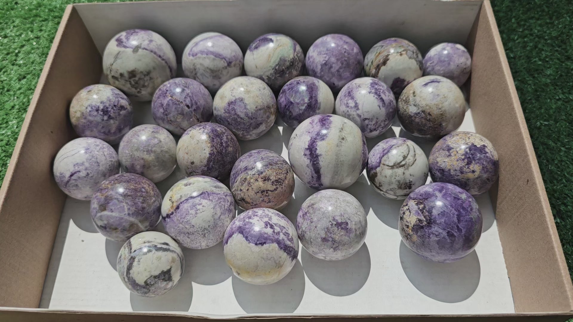 Load video: Lot 25 Spheres Bolivianite