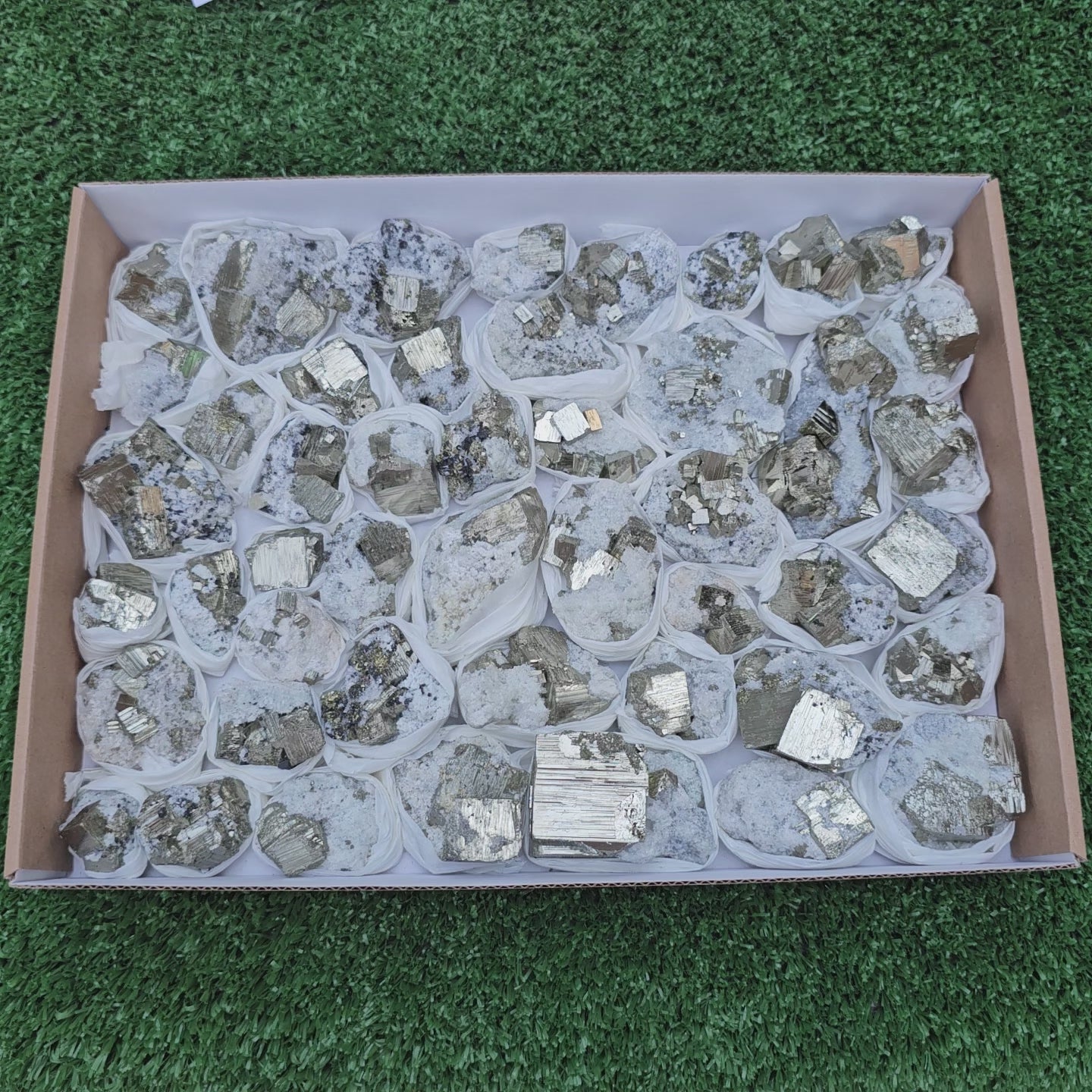 Load video: 48 pc Pyrite Cubic with calcite flourecent